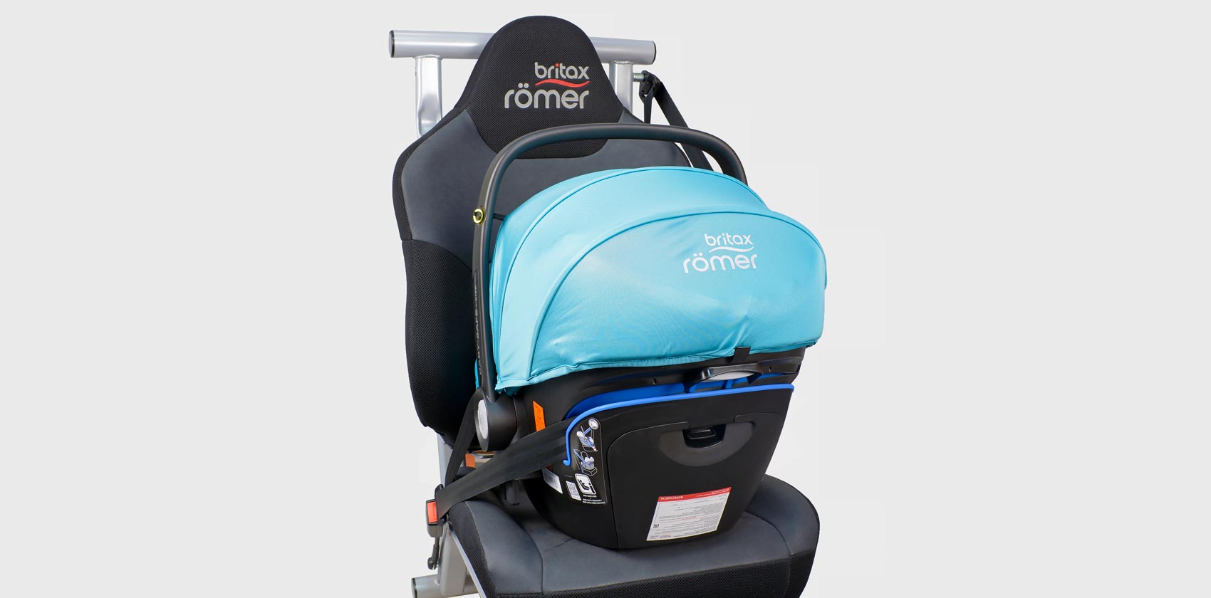 Britax Römer Baby-Safe² i-Size установка ремнём через направляющие